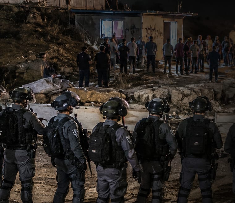 כוחות מג״ב פועלים במהלך פינוי לילי בגבעת תל תלפיות שבבנימין. במקום נרשמו עימותים בין כוחות הביטחון לתושבים, ובמהלכם דווח על פצוע אחד.