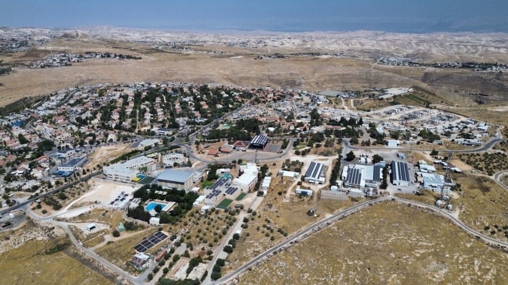 מבט פנורמי על היישוב תקוע והשטחים הפתוחים שמדרום לו, המדגיש את המרחב שעליו חלה תוכנית השלד